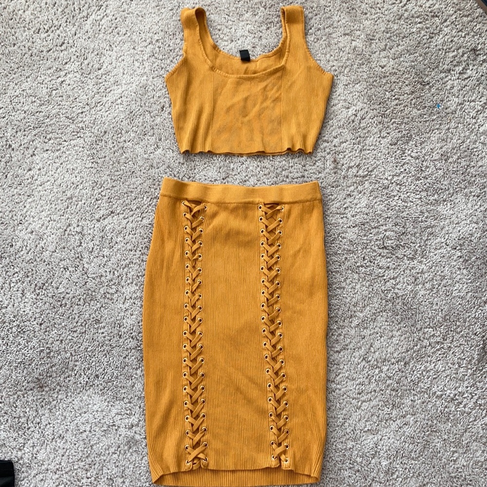 Mustard color two piece crop top and lace up skirt
